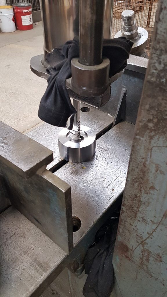 Machining a belt grinder roller