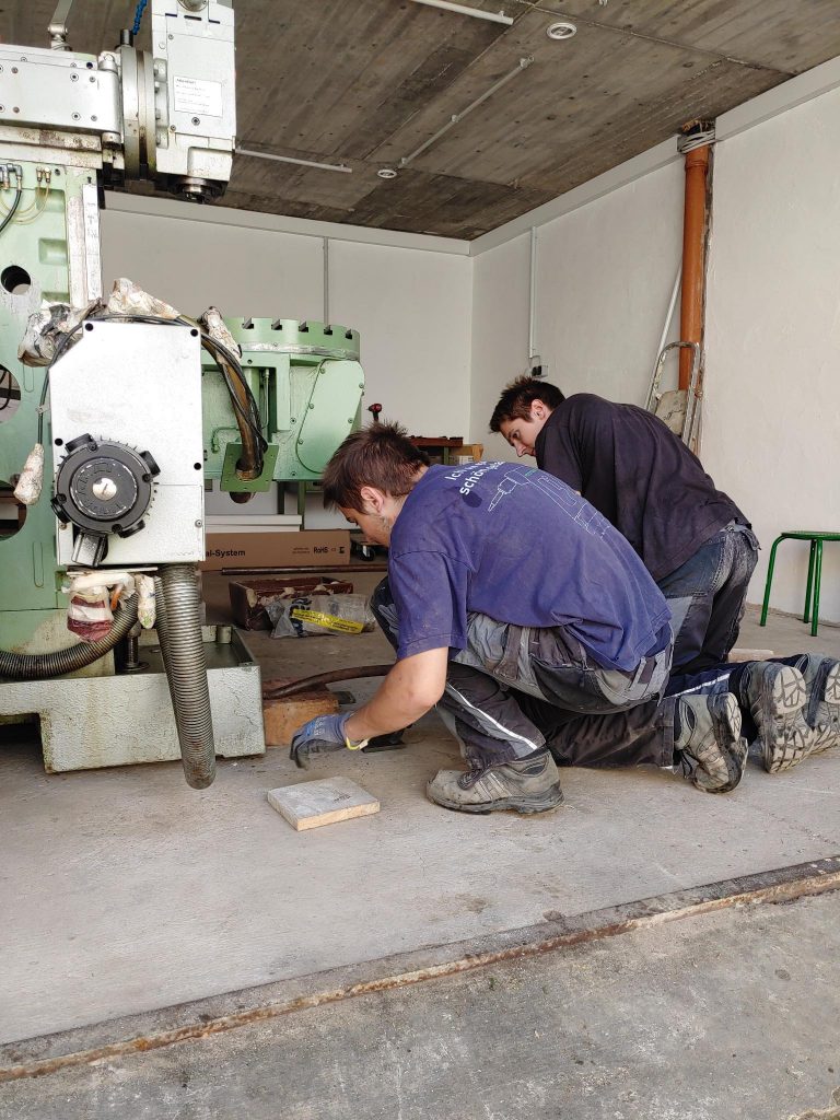 Lowering the MAHO machine into place